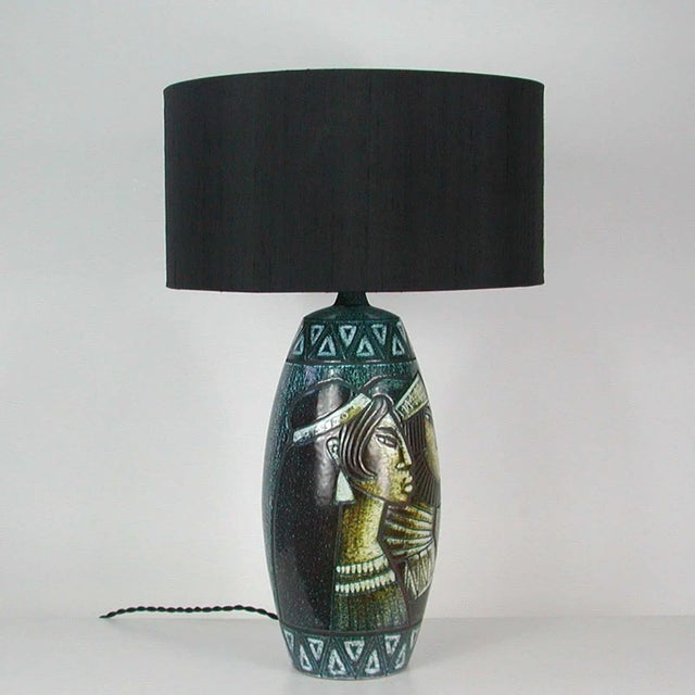 This large and elegant Scandinavian Modern table lamp was designed and manufactured in Sweden in the 1960s. Design Bonnie...