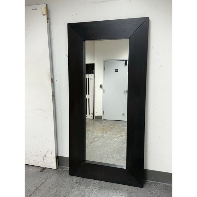 Design Plus Gallery presents a Malm Mirror by IKEA. Thick contemporary dark wood frame encasing the perfect mirror to lean...