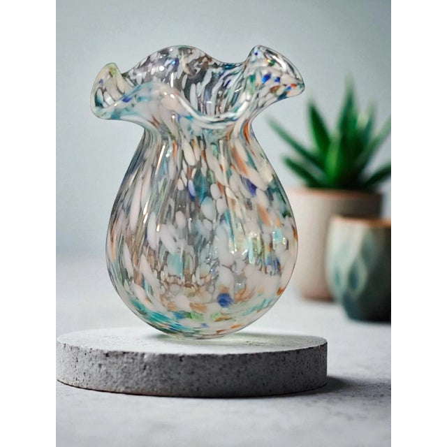The Vintage Attributed Murano Art Glass Ruffled Top Confetti Multi Color Vase is a beautifully handcrafted piece of mid-...