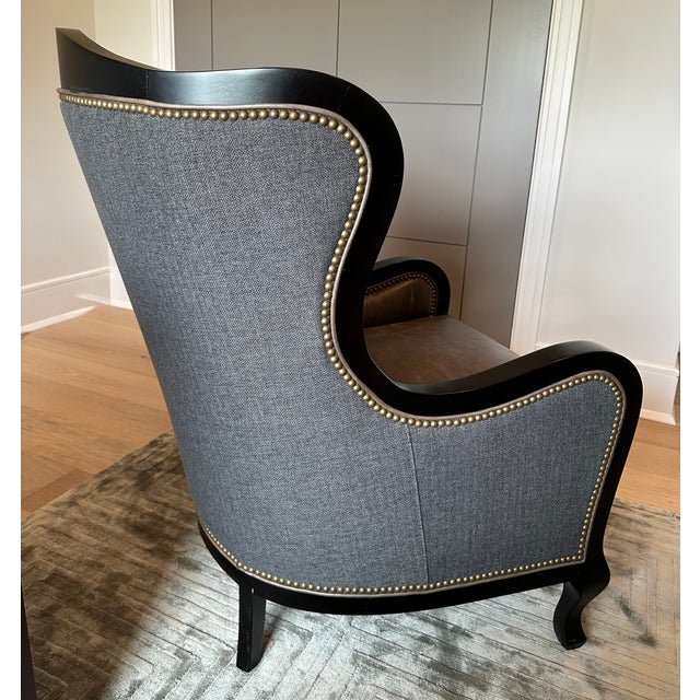 A masterclass in custom texture and tone, this Arhaus Catania Wingback Chair and matching ottoman set is a standout for...