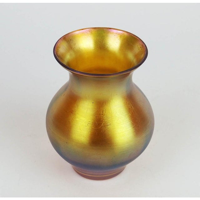 Vase in golden iridescent glass created by Karl Wiedmann for the Myra series published by the German manufacturer WMF,...