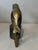 Stunning mid-century modern solid brass parrot sculpture on a heavy pedestal base. This striking vintage statue features...