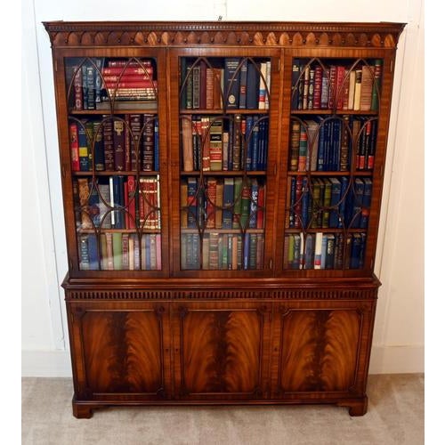 By bevan & funnell who were well known furniture makers based out of newhaven, england. A handsome mahogany three-door...