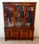 By bevan & funnell who were well known furniture makers based out of newhaven, england. A handsome mahogany three-door...