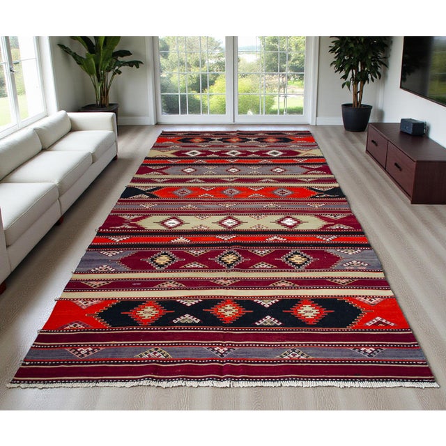 Woven in the 1940s in the Yildizeli district of Sivas, Central Anatolia, this striking flatweave kilim is an unused,...