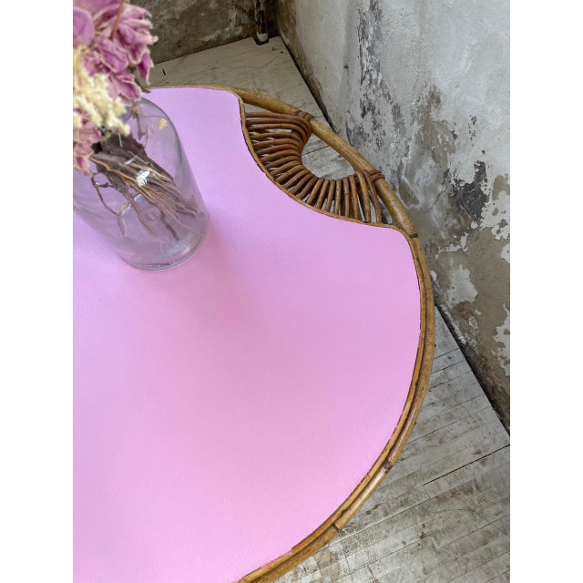 Small round coffee table from the 60s in wood and rattan, in the style of Janine Abraham's creations. We love the detail...