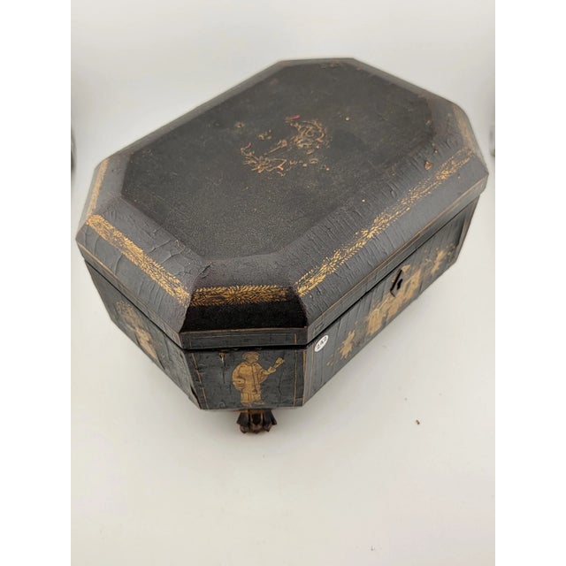 This antique Chinese tea caddy is a rare find from the 1800s. The tea caddy is made of wood and pewter and has a beautiful...