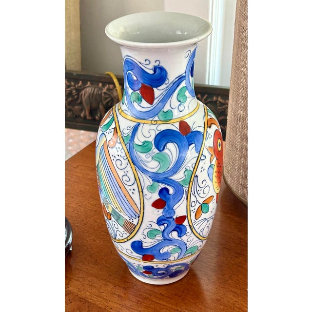 Large 12” vintage Mid-Century Chinese vase. Beautiful songbird design in an orange-reddish hue with swirls in turquoise,...