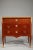 Late 19th century transitional style marquetry commode with three drawers. The set is topped with a breche d’alep molded...