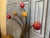 A playful and decorative wall coat rack with ornaments from France. The coat rack actually has iron branches tied together...