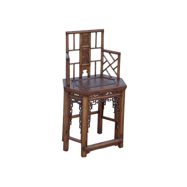 Discover the timeless elegance of this handcrafted wooden accent chair, featuring exquisite lattice-work detailing and a...
