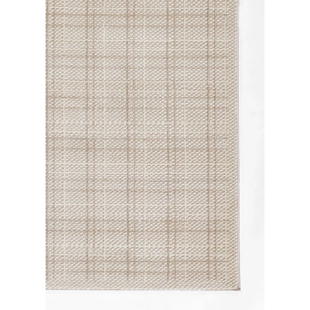 Elevate your interior with the timeless charm of this rug, designed to seamlessly blend into any decor style while adding...