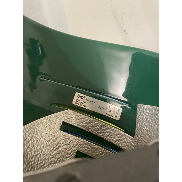 Pair of micron illuminazione wall lights circa 1980, biblo model. Ceramic, glass and metal. This piece has an attribution...