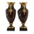 These elegantly crafted bronze urns stand tall on sleek black marble bases, enhancing their grandeur. With a classic...