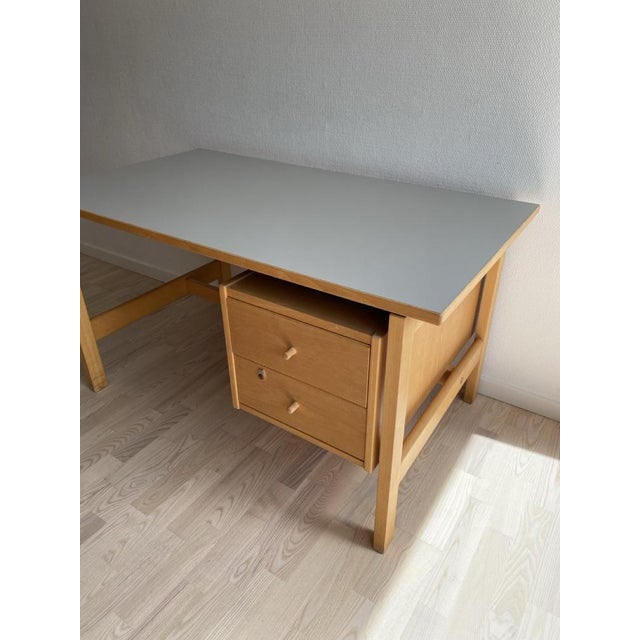 Beautiful desk designed by Hans J. Wegner for Getama, Denmark, 1970. This desk with two drawers was originally designed...