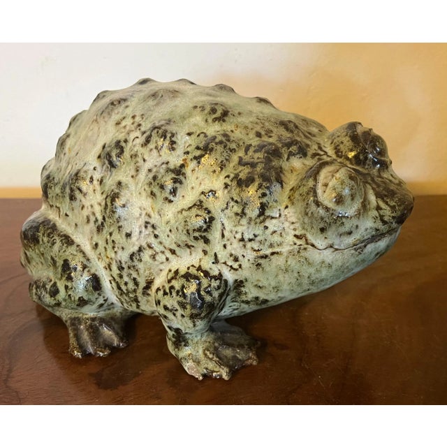 American art pottery Mid-Century Modern sculpture of a toad or bull frog. Naturalistically molded and glazed in shades of...