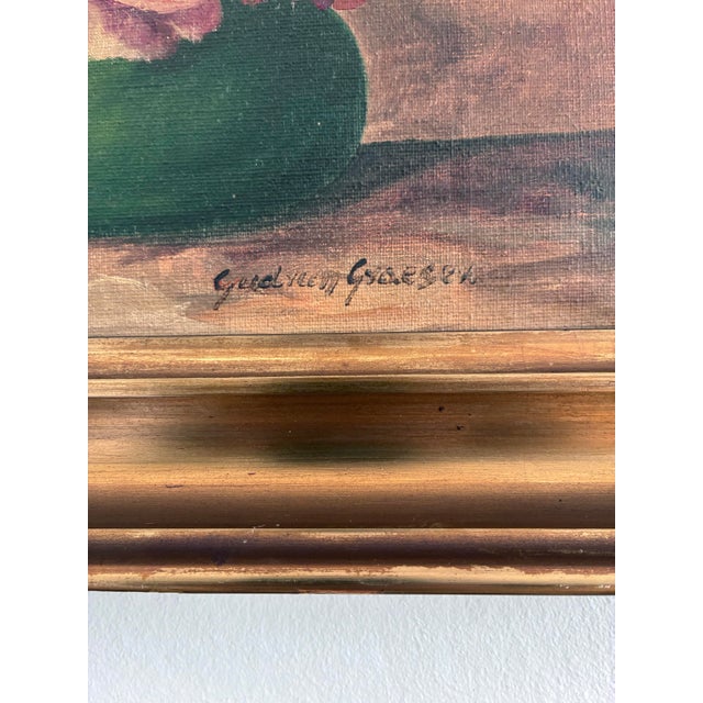 This original vintage floral oil painting, from around the 1930s, shows colourful flowers in a green vase. The warm brown...