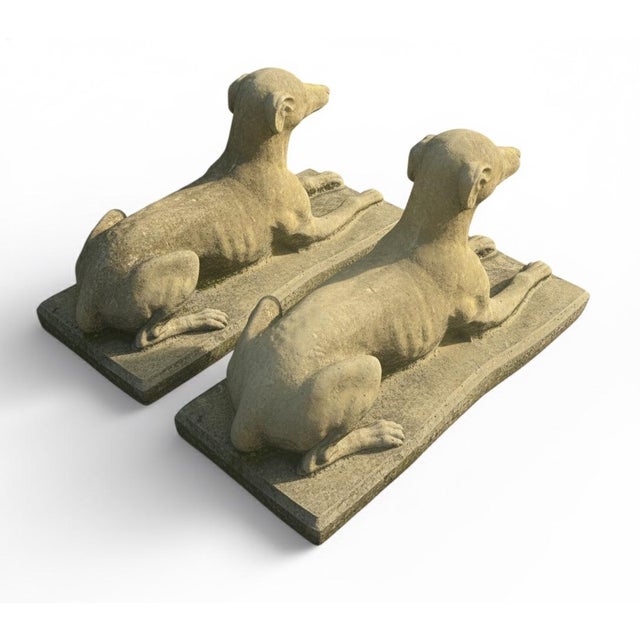 Charming pair of recumbent greyhound (or whippet) statues inspired by classic English estate gardens. Cast in...