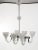 Vintage handblown clear glass [rostrato] oblong-shaped chandelier comprised of six lights. Ornate silver fittings and...
