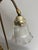 Up for consideration is a beautiful vintage brass tulip style lamp with a glass shade. This would look lovely in your...
