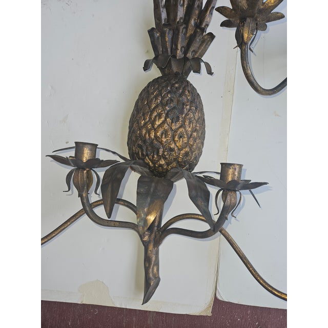 Very decorative Burnished Gilt Pineapple 4 arm candle wall Sconces made of Tole. Probably Italian..