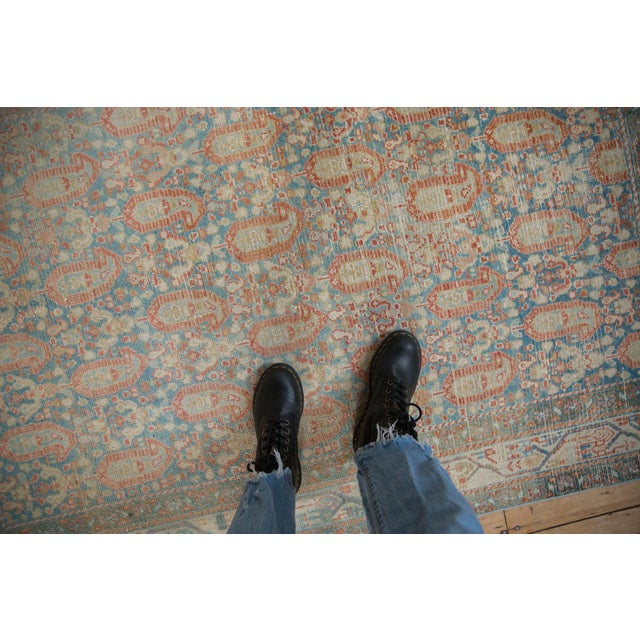 :: Allover covered field in boteh design elements arranged in staggered rows and alternating directions. Main border in a...