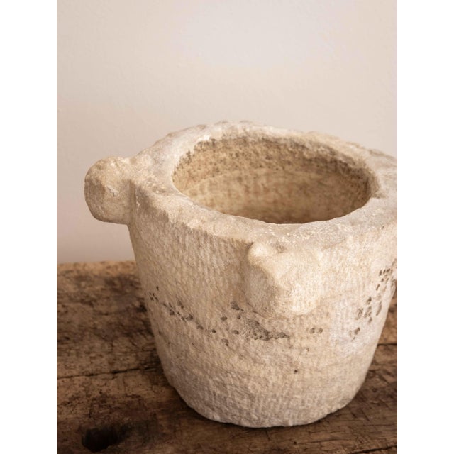 Large three-handled stone mortar recovered in Italy, 18th century.