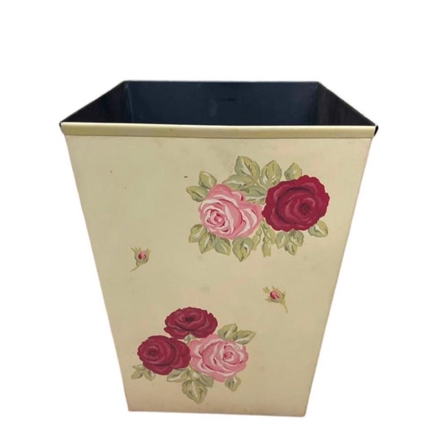 Add a touch of timeless charm to your home decor with this vintage metal wastebasket. Featuring a classic flared...