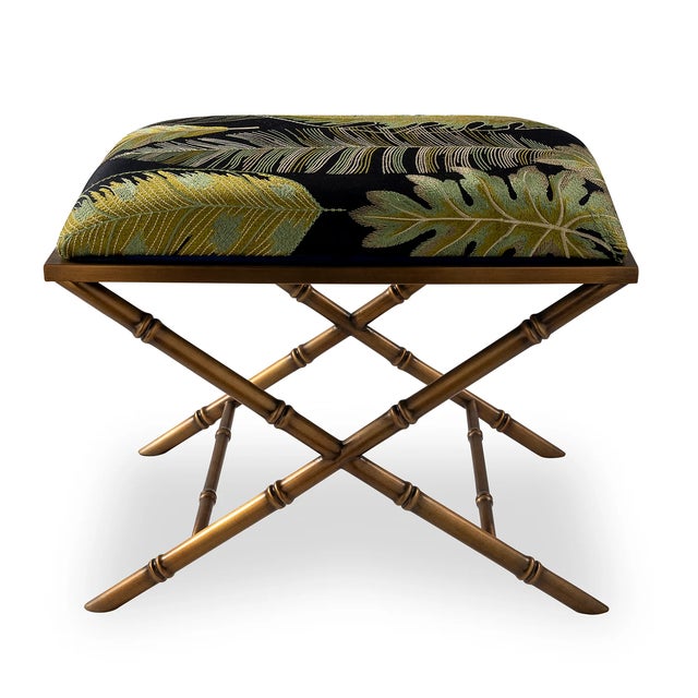 Classic detail of bamboo is featured on the Lauderdale upholstered bench. Cast steel metal frames are available in aged...