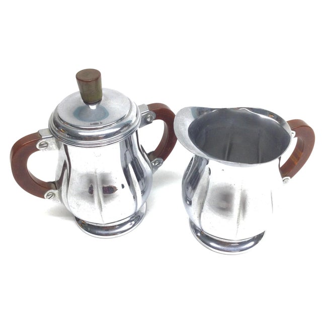 Stunning Art Deco era cream and sugar set by Fabre Bros. Use this set in the dining room or add it to your bar cart. Or...