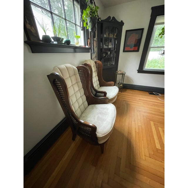 A pair of iconic LeWittes 1970’s Caned Wingback velvet upholstery chairs. From original home in 1970’s mansion formal...