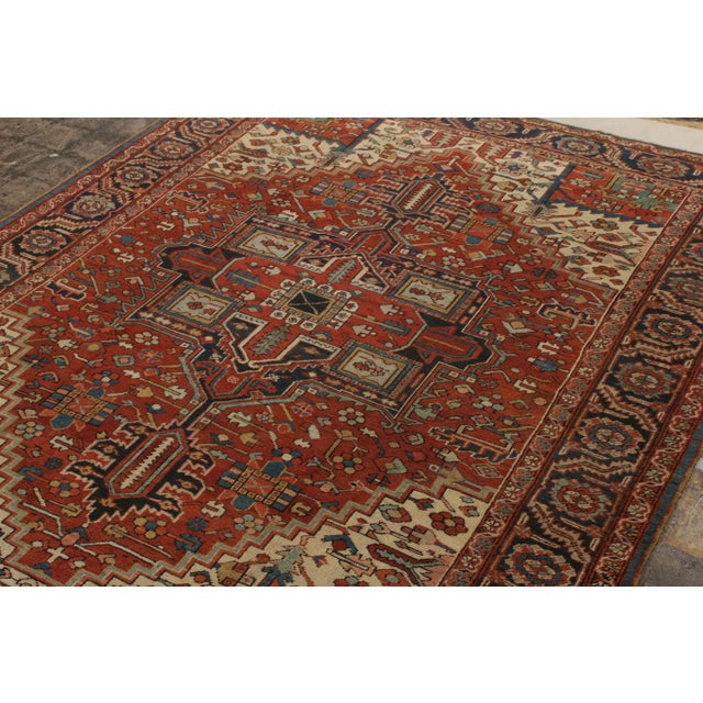 Hand knotted in wool, an antique 9x11 Persian Heriz rug joining Rug & Kilim’s coveted Antique & Vintage collection....