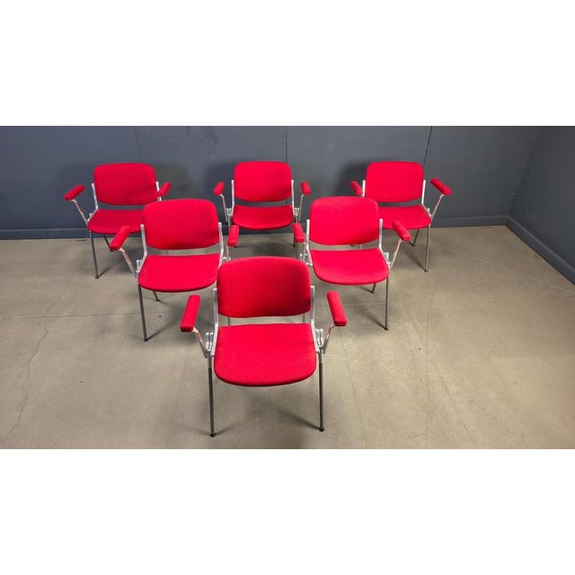 Vintage set of six DSC 106 Side Chairs, designed by the renowned Giancarlo Piretti for Castelli. These chairs are a...