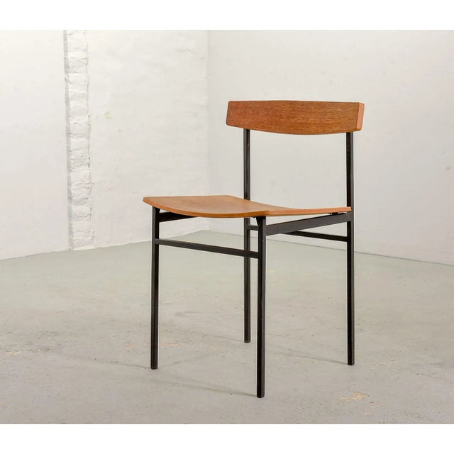 Pair of mid-century Dutch design dining chairs designed by Martin Visser around the 1960s. This set features an elegant...