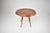 A vintage Italian side table attributed to Paolo Buffa, dating to the 1950s. The circular top is finished with a finely...