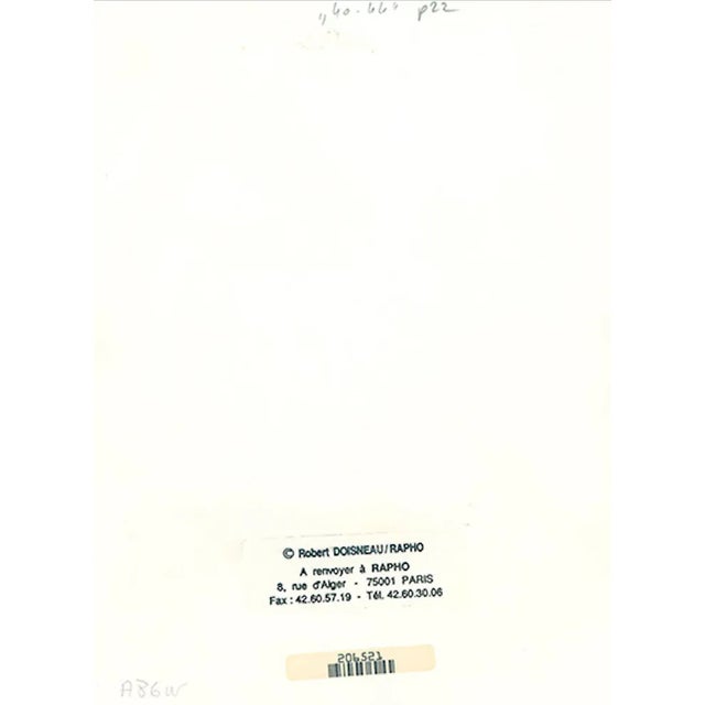 Robert Doisneau The Occupation Series: Newspapers, 1947 Silver print on glossy paper. Reproduced in the album Best of...