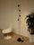 A striking vintage floor lamp with a tall, architectural profile and an ingenious system of individually adjustable...