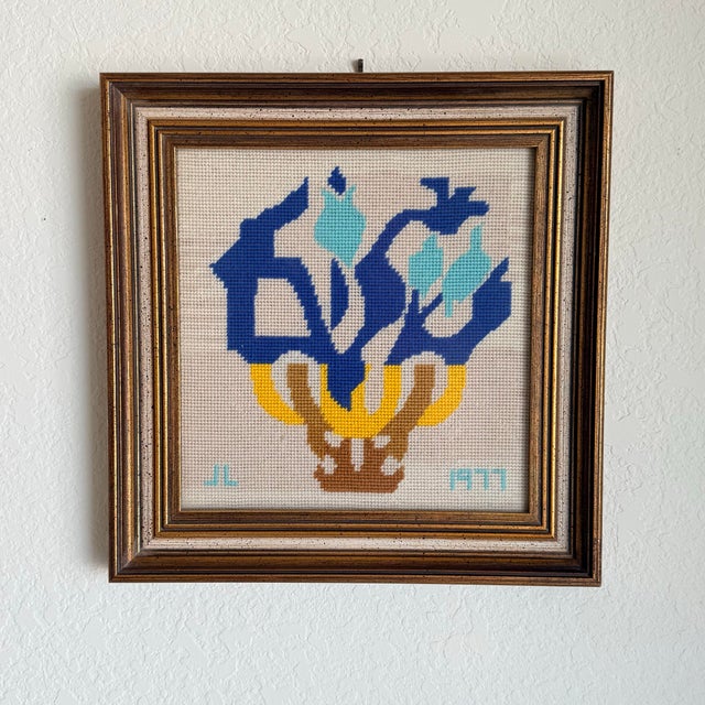 A beautifully graphic vintage needlepoint featuring stylized tulips in saturated cobalt blue with soft aqua accents,...