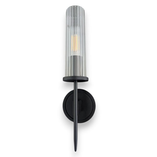 Black bronze, solid brass Jonathan Browning Alouette sconces with hand-finished reeded borosilicate glass shades. Model...
