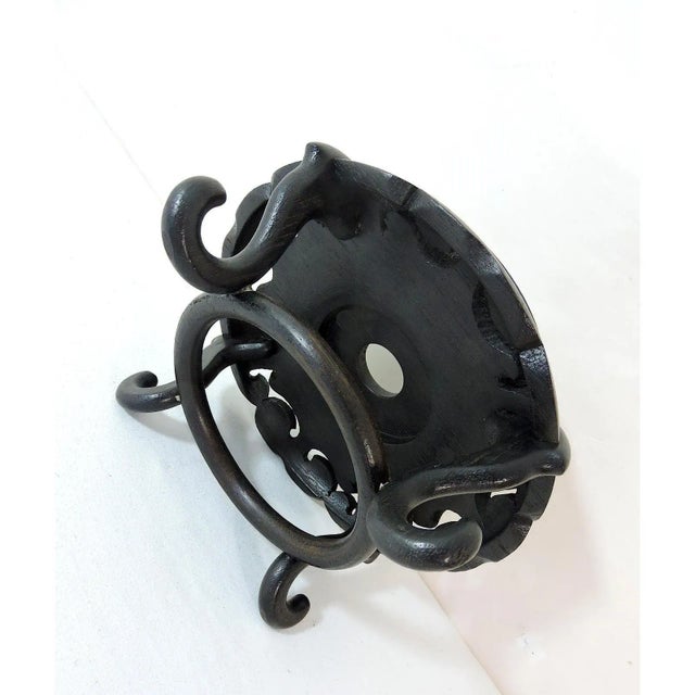 Delightful carved dark brown rosewood stand for displaying that precious piece. Central base ring supports four scroll...