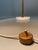 Gorgeous, minimalist, adjustable floor lamp, model 339, designed by Giuseppe Ostuni and produced by Oluce (Italy, 1950)....