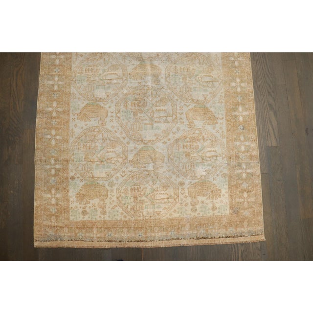 A pictorial ivory-ground color Balouch Rug from the middle of the 20th century