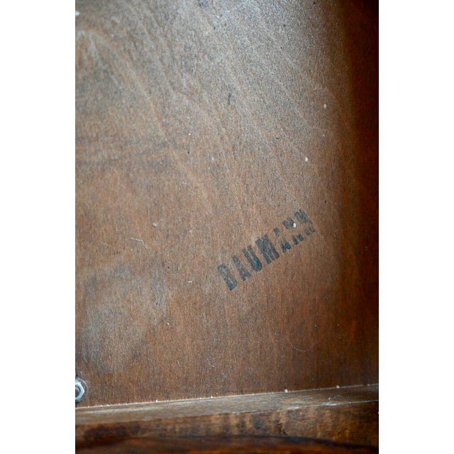 A classic piece of vintage furniture, this pair of bistro chairs is a product of the Baumann workshops in Franche-Comté....