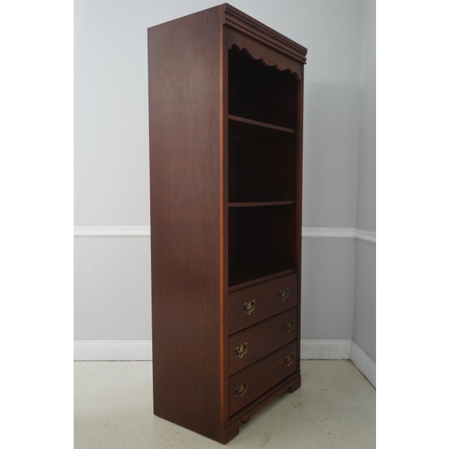 Age: Approx: 25 Years Old Details: Lights Behind Top Shelf Adjustable Shelves Nice Cherry Finish Production Quality...