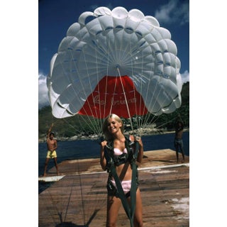Slim Aarons, Paraglider, Estate Stamped Photographic Print, 1968 / 2020s For Sale