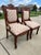 Pair of Antique Eastlake Victorian carved pierced walnut upholstered side chairs on curved front legs and castor feet....