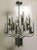 Chrome Chandelier chandelier by Gaetano Sciolari, 70’s. Gaetano Sciolari drew his inspiration from period candlesticks to...