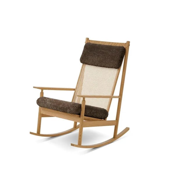 Swing rocking chair sheepskin oak drake by Warm Nordic Dimensions: D91 x W68 x H 103 cm Material: Wood, Foam, Rubber...