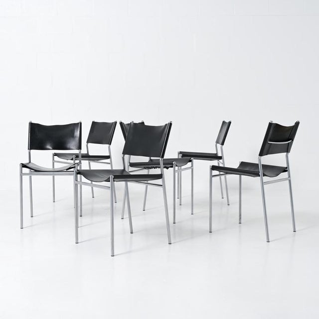 The dining chair SE 06 was designed by Martin Visser in 1960 for ‘t Spectrum. The upholstery consists of original black...