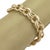This Textured Double Round Link Bracelet is a stunning vintage piece of fine jewelry, expertly crafted in solid 14k yellow...